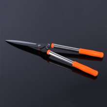 Mountain vine lawn shears. scissors. knife. Green lawn scissors. Agricultural garden trimming branches and scissors. Gardening tools 0013