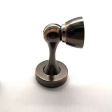 New brushed zinc alloy door stopper. The door touched. Thickened strong magnetic home American black door top suction