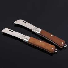 Manufacturers sell woodworking electric knives. Straight edge. Woodworking knife. Insulated electrician's knife. Electrician's knife with wooden handle. Hardware tools