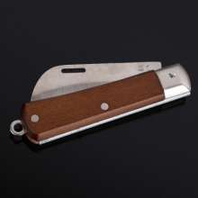 Manufacturers sell woodworking electric knives. Straight edge. Woodworking knife. Insulated electrician's knife. Electrician's knife with wooden handle. Hardware tools