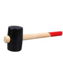 Self-produced and sold inverted rubber hammer with oval wooden handle. Rubber hammer. The hammer head can be replaced on the floor. Rubber hammer