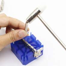Watch repair tools. Strap adjustment combination. Pozier watch strap cutter. Watch adjuster. Short punch. Small hammer