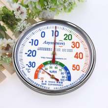 Metal case pointer thermometer and hygrometer. Temperature and humidity table for household indoor use. Hotel thermometer hygrometer