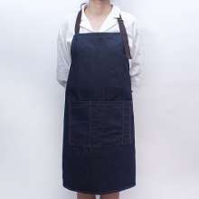 Washed oversized denim halterneck tether apron. Customized overalls apron