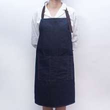 Washed oversized denim halterneck tether apron. Customized overalls apron