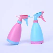 Candy-colored small watering can. Water bottle. Watering can. Gardening watering can. Small hand-pressing spray can for green plants