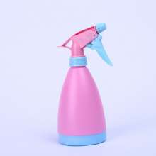 Candy-colored small watering can. Water bottle. Watering can. Gardening watering can. Small hand-pressing spray can for green plants