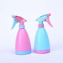 Candy-colored small watering can. Water bottle. Watering can. Gardening watering can. Small hand-pressing spray can for green plants