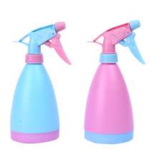 Candy-colored small watering can. Water bottle. Watering can. Gardening watering can. Small hand-pressing spray can for green plants