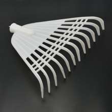 Self-produced and sold agricultural rakes. Garden Tools. Rake a hay rake. Plastic grass rake large size