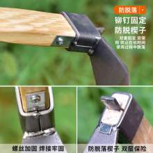 Hua hoe outdoor agricultural gardens. Gardening tools. Fishing and weeding hoe. A small hoe with a short wooden handle for hoeing grass growing vegetables. Pointed hoe