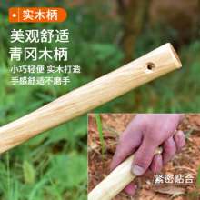 Hua hoe outdoor agricultural gardens. Gardening tools. Fishing and weeding hoe. A small hoe with a short wooden handle for hoeing grass growing vegetables. Pointed hoe