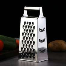 Stainless steel grater vegetable cutter . Potato shredding tool . Kitchen multifunctional manual household grater