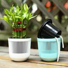 Meixuan hollow striped hydroponic flower pot. Self-absorbent plastic resin PP water storage flower pot green dill flower pot. Potted plant