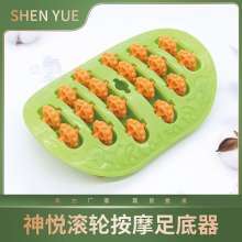 Small mini plastic foot massager.Roller foot massager.Acupressure massager