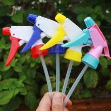 A gun beverage bottle nozzle watering spray bottle head. Kettle spray head. Cola beverage household hand-buttoned plastic spray bottle head