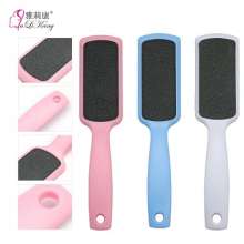 White square feet rub. Sandpaper is dead skin. Grinding feet. Stone Foot Skin Removal Massage Tool
