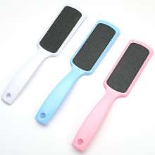 White square feet rub. Sandpaper is dead skin. Grinding feet. Stone Foot Skin Removal Massage Tool