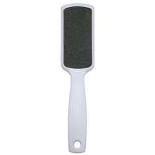 White square feet rub. Sandpaper is dead skin. Grinding feet. Stone Foot Skin Removal Massage Tool