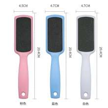 White square feet rub. Sandpaper is dead skin. Grinding feet. Stone Foot Skin Removal Massage Tool