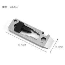 Stainless steel outdoor multi-function gadgets. Outdoor equipment Camping supplies. Wrench, screwdriver. Cross batch wrench bottle opener