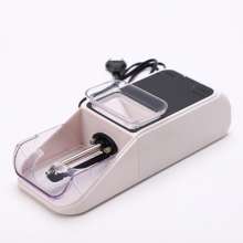 New automatic cigarette maker. Small household cigarette maker. Homemade electric high-power cigarette grinder.