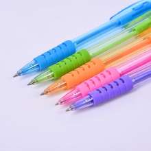 Press the ballpoint pen. Pen stationery. Plastic transparent rod next to the jump ballpoint pen office simple pen