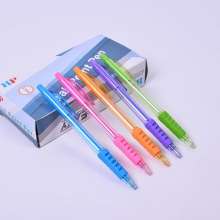 Press the ballpoint pen. Pen stationery. Plastic transparent rod next to the jump ballpoint pen office simple pen