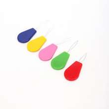 Multicolored plastic thread threading device.DIY cross-stitch matching tools lead device. Thread threading. Rust tools
