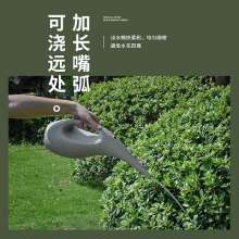 Long mouth watering pot. Domestic indoor garden watering pot for flowers and vegetables. Watering can and watering can