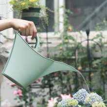 Garden watering can. Portable garden plastic watering pot for household use. Watering pot capacity 2 liters