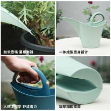 Garden watering can. Portable garden plastic watering pot for household use. Watering pot capacity 2 liters